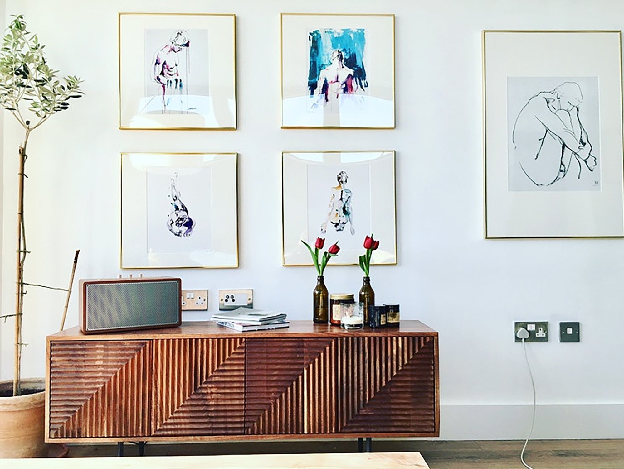 Male nude art print displayed in a modern home, watercolor by Brenden Sanborn