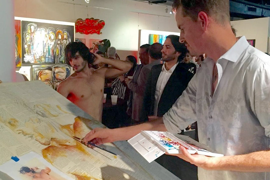 watercolor artist Brenden Sanborn painting male figure art live at gallery event