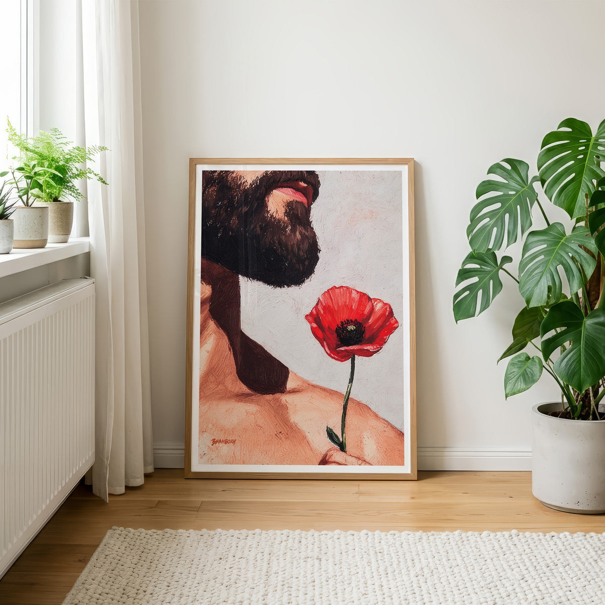 Wildflowers art print by Brenden Sanborn, a bearded man holding a red poppy, framed and leaning by a window with a monstera plant