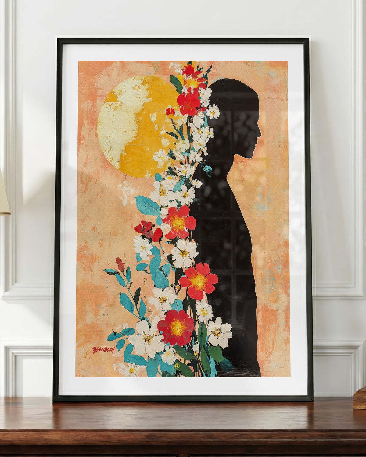 Sun Keeper art print in a black frame, shown up close