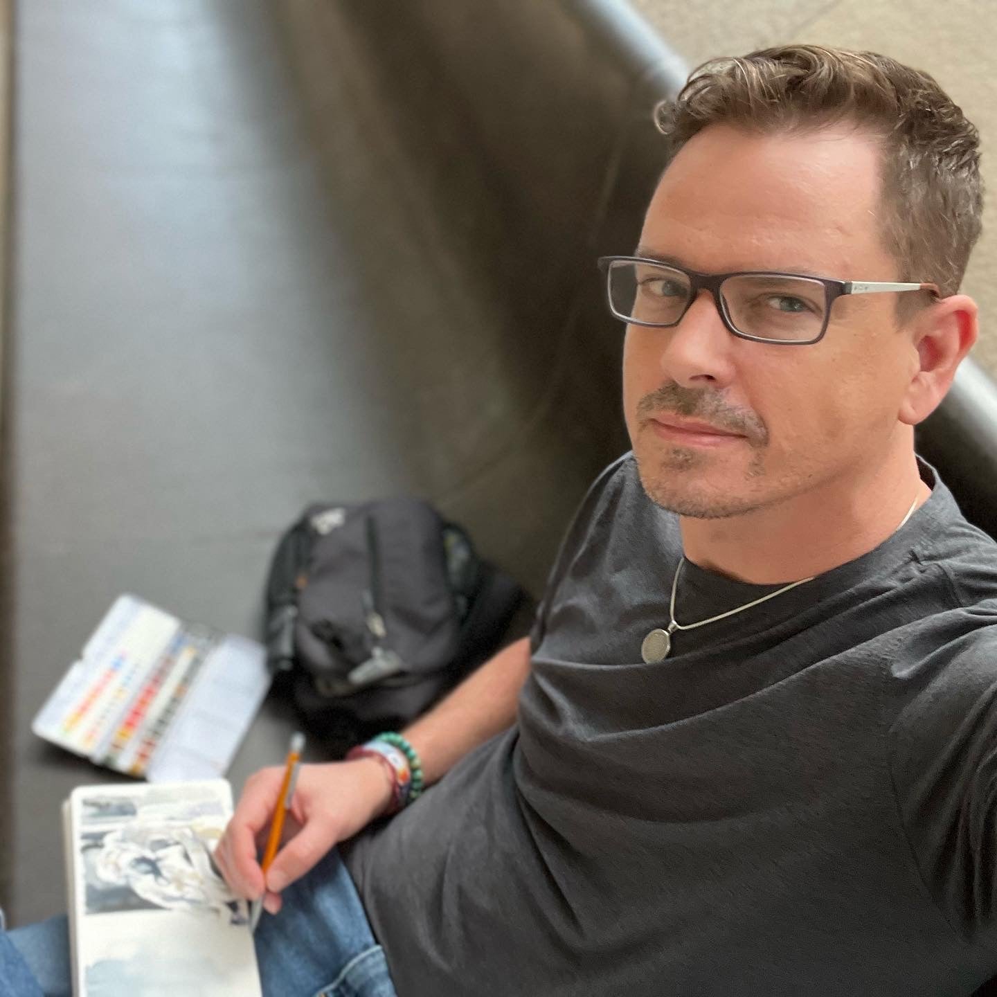 watercolor artist Brenden Sanborn sketching inside Musée d'Orsay Paris France