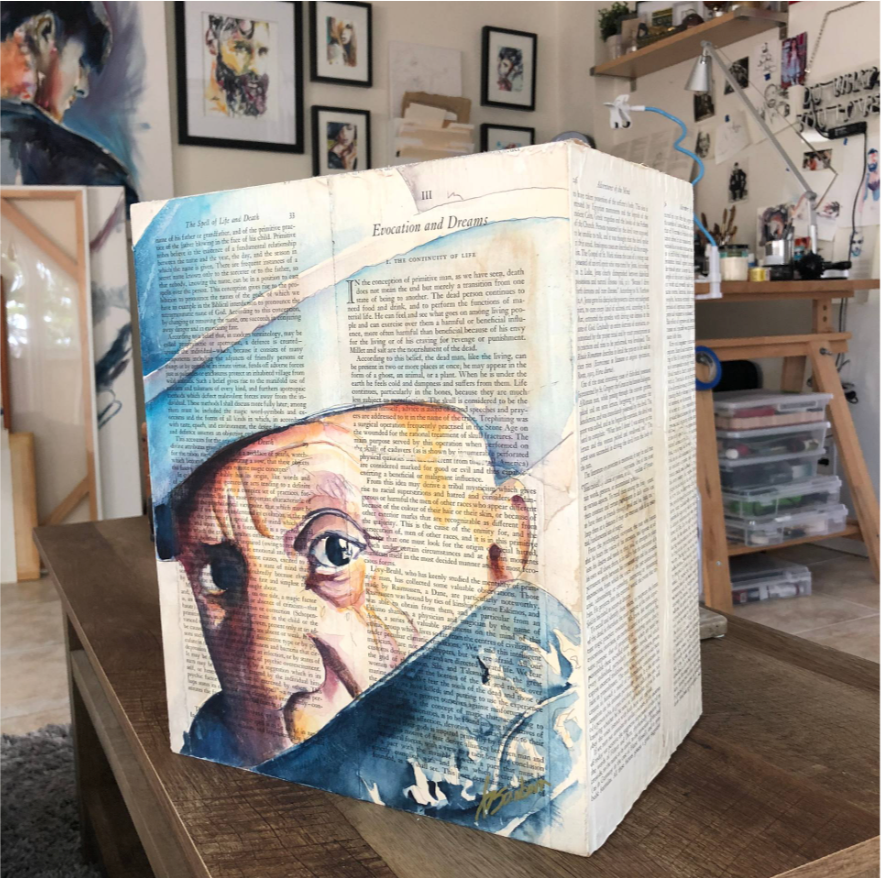 Picasso watercolor sculpture on book pages mounted on wooden milk carton by Brenden Sanborn