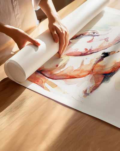 Hands unrolling the Heavenly Moment fine art paper print, showing the white border