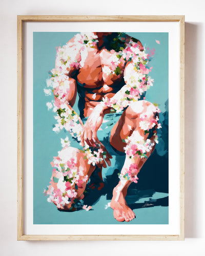 Low Bloom art print by Brenden Sanborn, a crouching figure wrapped in cherry blossoms on a teal background, shown in a light wood frame