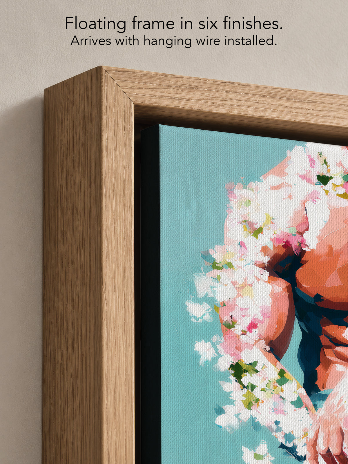 Close up corner of Low Bloom in a natural oak floating frame, with black canvas edges and hanging wire installed