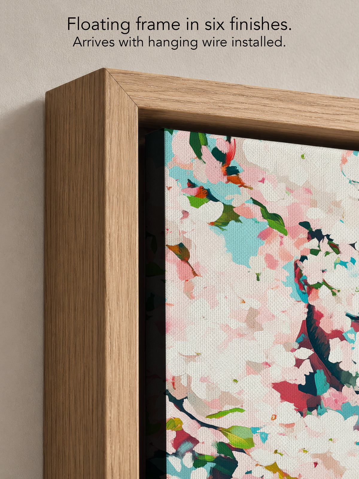 Close up corner of Pale Weather in a natural oak floating frame, with black canvas edges and hanging wire installed