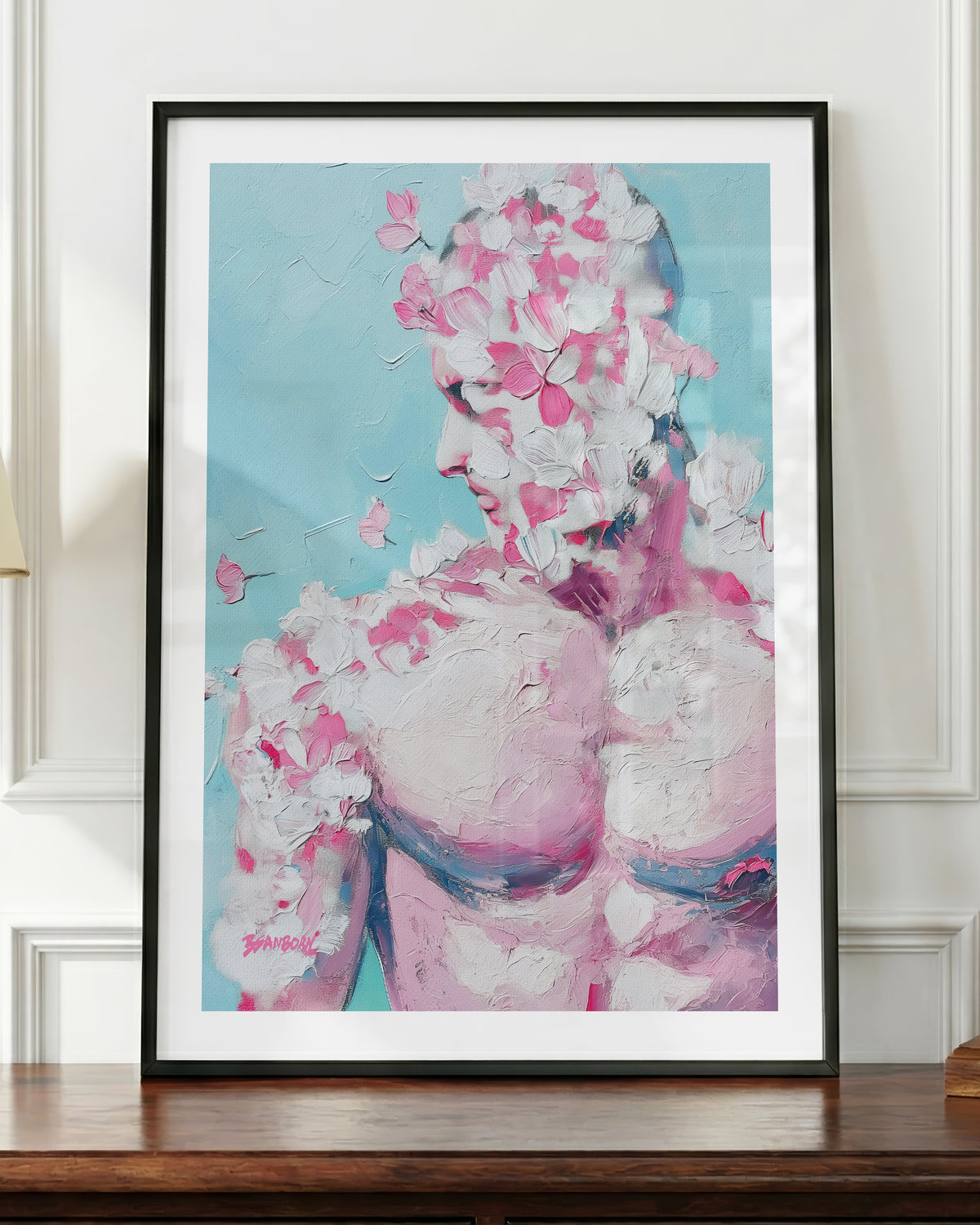 Rose Plaster art print in a black frame, shown up close