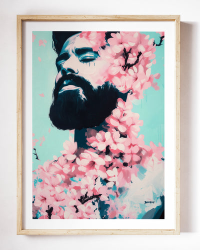 Spring Exhale art print by Brenden Sanborn, a bearded man with his eyes closed and face lifted, cherry blossoms across his chest, shown in a light wood frame