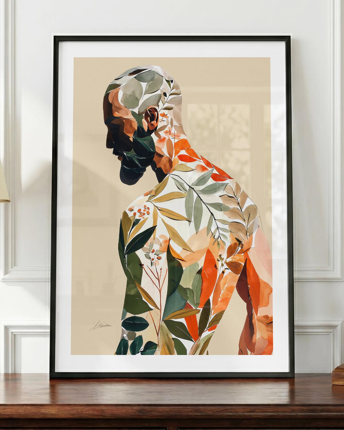Turning Leaf art print in a black frame, shown up close