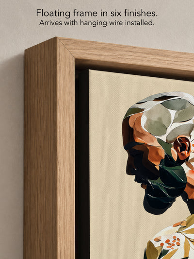 Close up corner of Turning Leaf in a natural oak floating frame, with black canvas edges and hanging wire installed