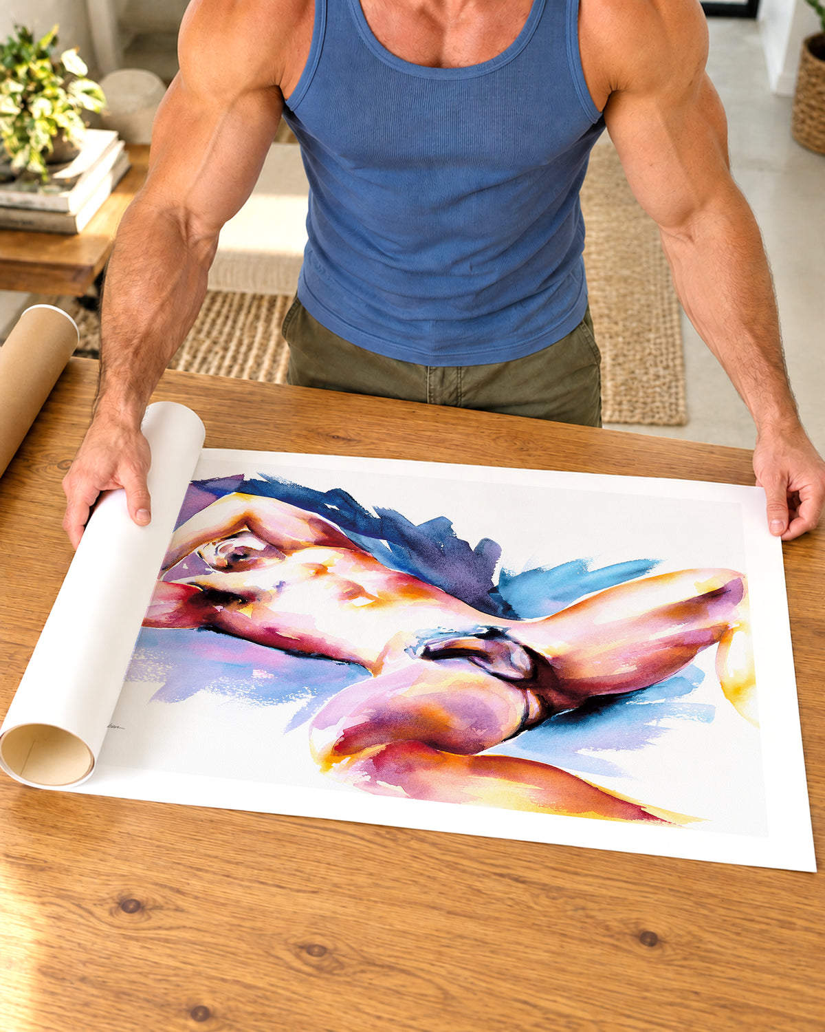 A man unrolling the Wide Awake fine art paper print, showing the white border
