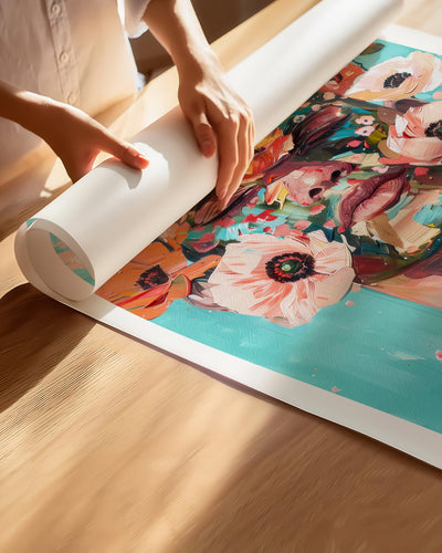 Hands unrolling the Wild Mask fine art paper print, showing the white border